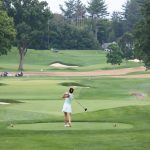 Golfer hits ball at Oak Hill Country Club during 36th Annual A Salute to Veterans Golf Tournament